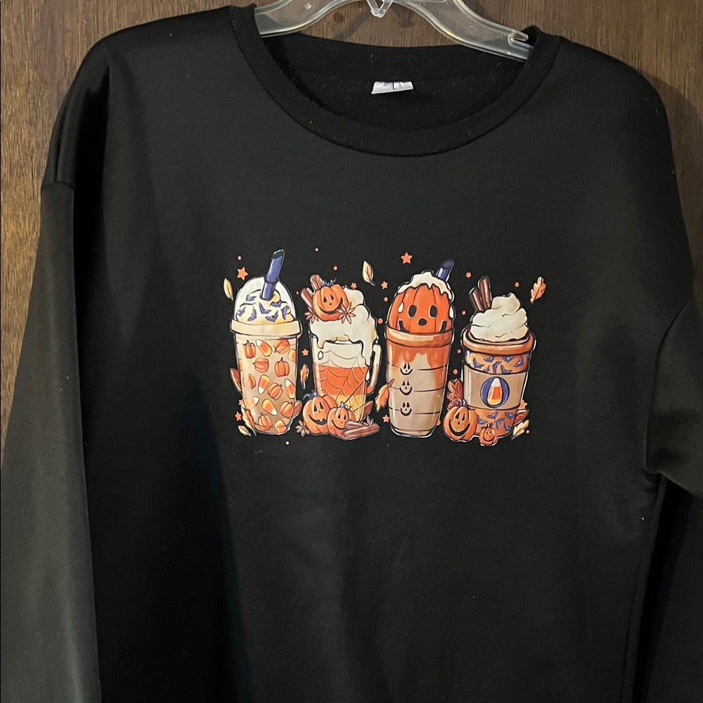 Ladies fall sweatshirt. Black color, size L